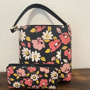 Kate Spade navy flower bag. Has been gently used. Sold as a set